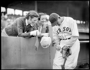 Red Sox player signs autograph at Fenway