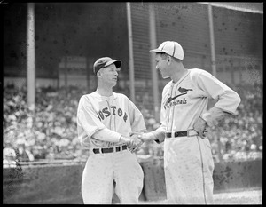 Lefty Grove of the Red Sox shakes hands with St. Louis Cardinal, Braves field