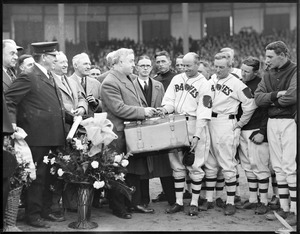 Presentation of suitcase at Braves Field, manager Bill McKechnie looks on