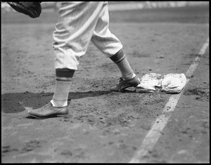 Close up of Bees first basemen with foot on bag