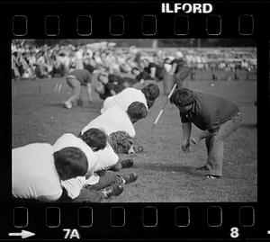 Man yells at tug of war competitors