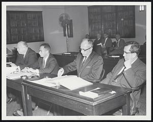 1 shot seated L to R at Table. Samuel Abrams, George Abrams, attorneys for Gorden Hughes Bldg Comm. Coughlin Clerk. Bldg Dept.