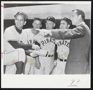 Pittsburgh Pirates manager Bobby Bragan with four unidentified men