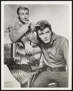 It's a Bad Business. Nick Adams (left), starring as Johnny Yuma, hopes to show Jack Chaplain, as his cousin, Eddie, that the gunfighting business is shot in "The Last Drink" on "The Rebel" Sunday, Feb. 26 (ABC-TV, 9-9:30 p.m. EST).