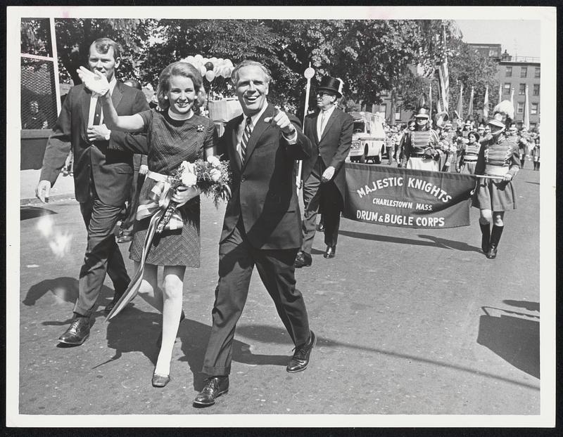 Up Front in the line of march at the Bunker Hill Day parade in Charlestown were Mayor and Mrs. Kevin White is a Charlestown native. The mayor flew back from a Pittsburgh conference of mayors to participate in the parade.