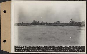 Contract No. 85, Manufacture and Delivery of Precast Concrete Steel Cylinder Pipe, Southborough, Framingham, Wayland, Natick, Weston, looking east from a point near Speen Street showing man standing in vicinity of place used for engineers' buildings, Natick, Mass., Sep. 5, 1940