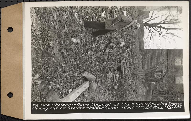 Contract No. 71, WPA Sewer Construction, Holden, 4-A line, Holden, open cesspool at Sta. 4+50, showing sewage flowing out on ground, Holden Sewer, Holden, Mass., Apr. 2, 1941