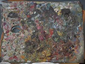 Wooden palette with blobs of paint