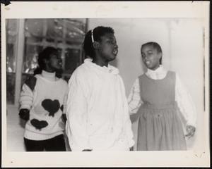 Trio of girls singing