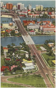 View showing New Indian Creek Bridge and ramp at 61st Street, St. Francis Hospital on right, Miami Beach, Florida