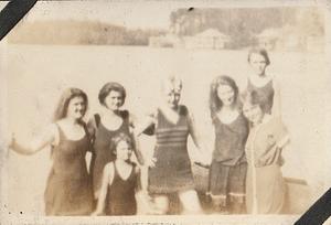 Group of women and child at the beach