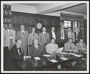 Boston Chamber Organizes Committee on American Opportunity. First meeting was held in Directors' Room on Wednesday, June 20. Reading left to right, front row: Bernard F. Ostreicher, advertising agency executive: Dr. Alexander Brin, Jewish Advocate; Wallace G. Strathern, Eastern Gas & Fuel Associates; Gilbert L. Earle, Eastern Gas & Fuel Associates (guest); Paul A. Newsome, Chairman, Chamber’s Committee on Public Relations. Rear, left to right: Leon Lomax, South End Electric Co.; Jams H. Walsh, Managing Director, Boston C. of C.; John Adam Jr., Chairman of Committee; Central Manufacturers Mutual Ins. Co.; William M. Hogan, Jr., N. E. Tel. & Tel.; Leonard Peters, Peters Employment Service; Howard W. Lewis, Business Forms Corp.; Donald Segal, Samuel Cupples Envelope Co., Inc. and Pierce J. Haley, Secretary of Committee, Boston C. of C. Also present were Dr. Dennis C. Haley, Supt. Of Boston Public Schools, and Assistant Supt. Frank J. Herlihy.