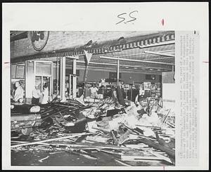 Whoof -- The front of a supermarket on Route #7 in Schenectady, N.Y. shows the brunt of the tornado-like winds that tore off roofs and leveled buildings in this city earlier this evening. Firemen and police described the storms as twisters. Photo was made by freelance photographer John Nealand of Troy, N.Y.