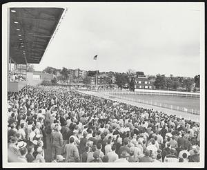 Track Opening-Greyhound racing starts again Wednesday at Wonderland amid indications of another busy year. Here’s part of the crowd of 20,000 that attended last year’s opening. More than 1,300,000 attended the races during the last season.