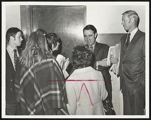 Boston Teachers talk to members of the School Committee. Paul R. Tierney, right and John J. Kerrigan, in Superior Court House corridor yesterday.