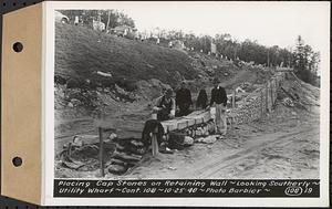 Contract No. 108, Utility Wharves, Quabbin Reservoir, Ware, placing cap stones on retaining wall, looking southerly, Ware, Mass., Oct. 25, 1940