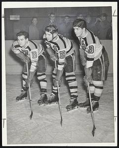 Bruins' Sprouting Sprouts - The youngest hockey line probably ever to wear major league spangles are Boston's Sprouts. Left to right, they are Johnny Schmidt, right wing; Don Gallinger, center, and Armand "Bep" Guidolin, left wing.