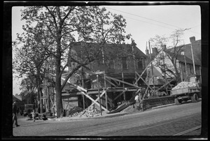 Home of the Claus family, corner of Roxbury and Elmwood, remodeling for the Pioneer grocery store, (Parad)