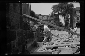 Rebuilding the big wall, 42 Highland Ave. Roxbury, Mass., Mr. James Mulvey in the picture