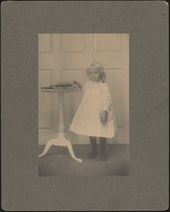 Eleanor Heard Russell at age 7, standing