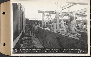 Contract No. 56, Administration Buildings, Main Dam, Belchertown, laying brick on west wall of second floor of administration building, Belchertown, Mass., Dec. 20, 1937