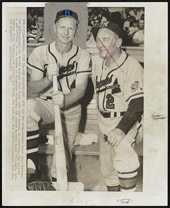 Red Schoendienst With His New Boss -- Former Giant second baseman Red Schoendienst and Braves manager Fred Haney Both wear smiles. In addition, Red carries a new uniform. He was traded to Milwaukee yesterday for second baseman Danny O'Connell, outfielder Bobby Thompson and pitcher Ray Crone. But took that big Louisville Slugger with him.