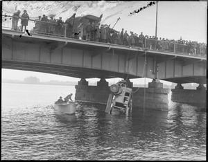 Hauling auto out of Charles River