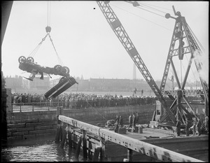 Pulling out the death truck that killed two men as it plunged into the Mystic River at Chelsea Bridge