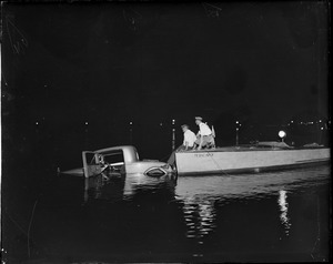 Fishing out auto that went into Charles