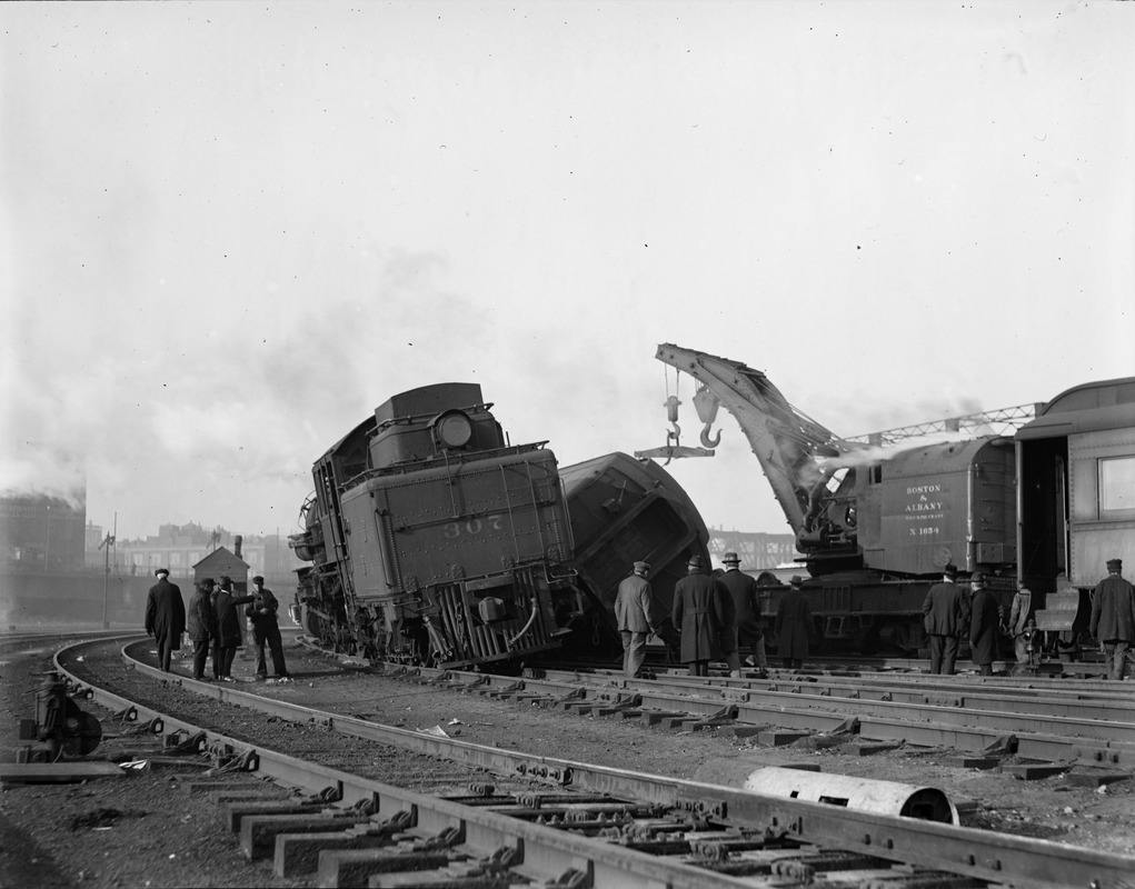 Train wreck. Boston & Albany R.R. tank locomotive No. 307. B&A R.R. wrecking crane No. X1654 assisting.