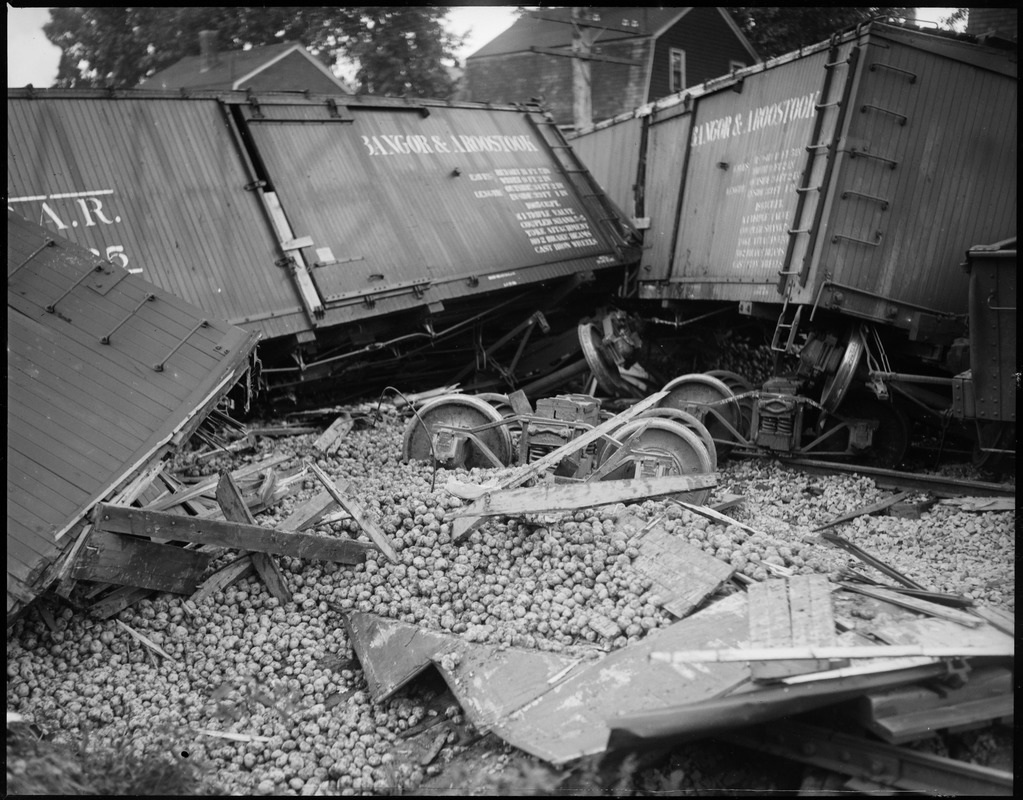 Wreck of Boston & Maine freight train at Medford Hillside - Southern Division. 55 cards loaded mostly with potatoes.