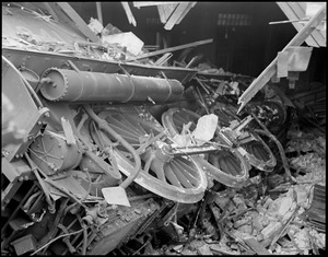 Steam train plows through Stoughton R.R. Station into cellar