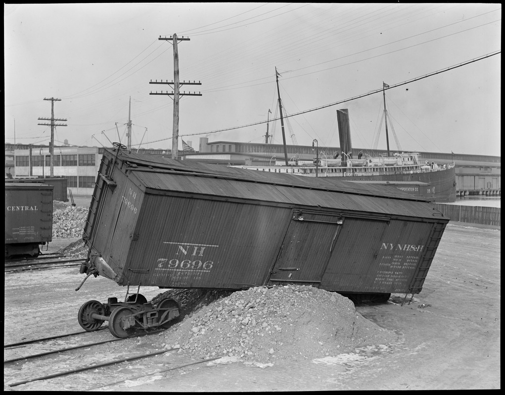 Freight car jumps bumper on Northern Ave, N.Y. & N.H. Freight Yard, South Boston