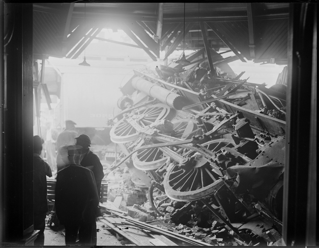 Train jumps track and locomotive plows into R.R. Station at Stoughton, MA.