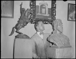 Karl Skoog, Boston sculptor, modeling bust of Christ, Teddy Roosevelt on left and Last Amazon on right