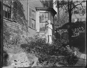 Statue on front lawn of house on 100 Warren St., Roxbury