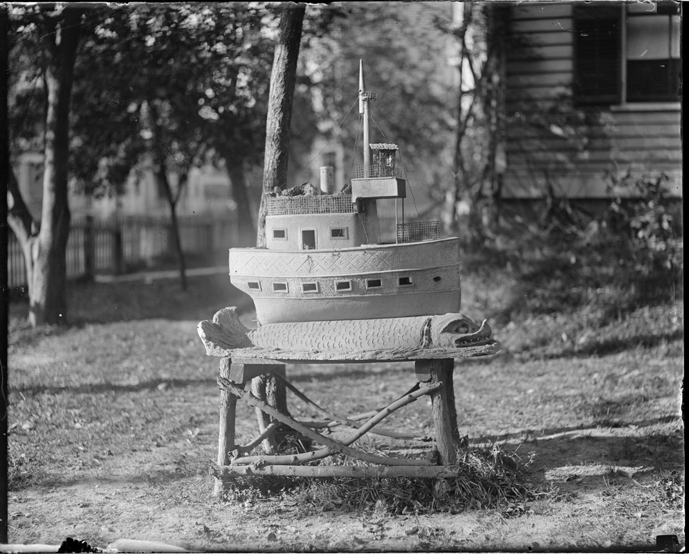 Small concrete ship in front yard at 29 Charles St., Dorchester