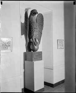 Carving of eagle on display in museum
