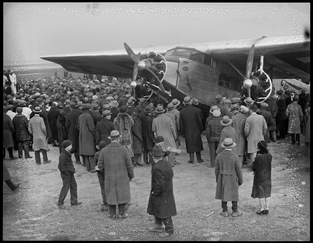 Ford plane lands at East Boston Airport, people (trimotor)