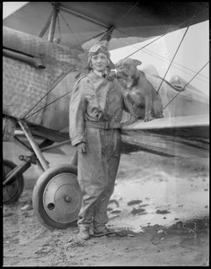 Mrs. Dorothy Warrick, a student at East Boston Airport. From Pittsburg, PA. Wife of a Tech student flies with Hargenhaig, her 13 blue ribbon English bulldog.