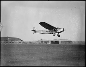 Ford trimotor taking off from East Boston Airport