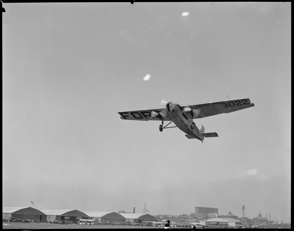 Ford trimotor in flight, East Boston Airport