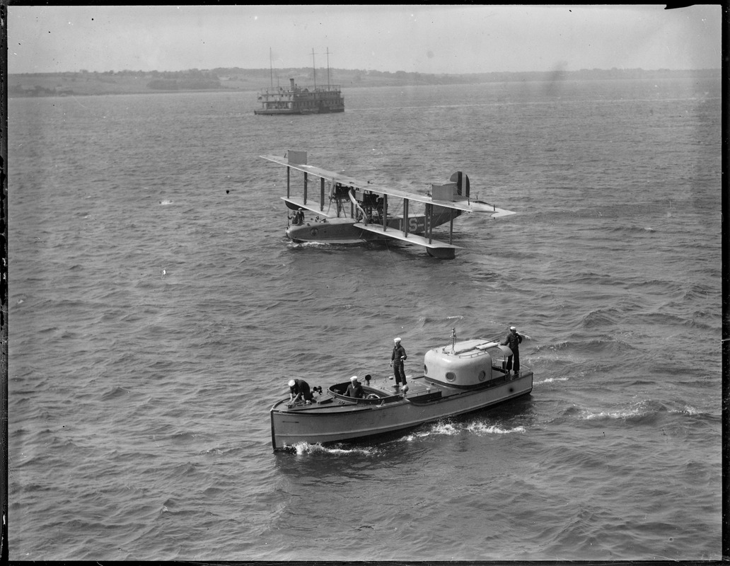 Seaplane in water floats nearby