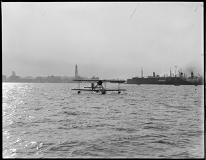 Mail plane from S. S. Ile de France under command of Pilot Domergue and Radio Operator Laurent Coilluotte, Boston Harbor