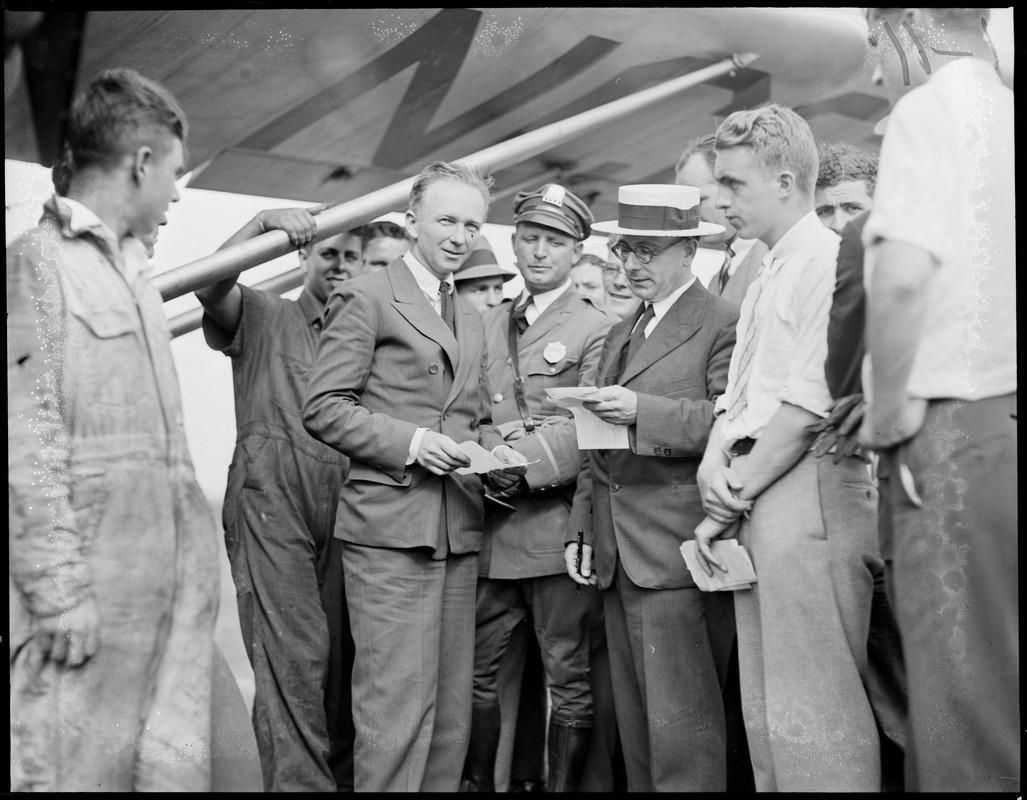 Clarence Chamberlin: Famous flier brings injured Ruth Nichols to East Boston Airport from New Brunswick. She was strapped on a cot inside of plane.