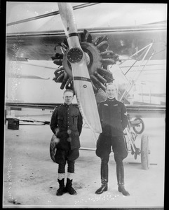 Lt. E. Lundberg (Right). The Swedish aviator who rescued Nobile and who in a second flight overturned his plane on the ice. At the left is Sgt. Holmberg - Lundberg's co-pilot.