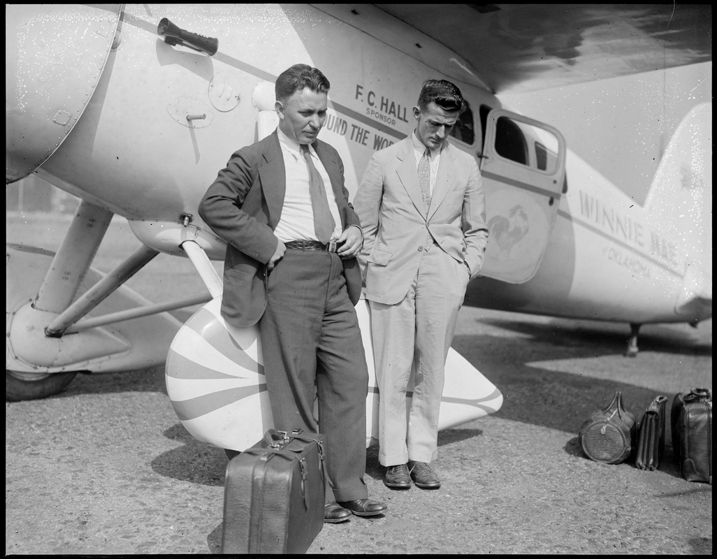 Wiley Post and Harold Gatty in Boston East Boston Airport. They are the round the fliers. Plane: Winnie Mae