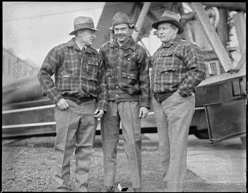 Bernt Balcher, Enslow and Cooper before flight to Horse Island, Newfoundland from East Boston to bring supplies to survivors of the Viking disaster