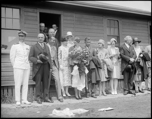 Miss Amelia Earhart's guests greet her when she arrives at East Boston Airport