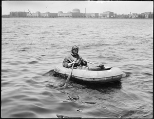 Lt. Commander Byrd in rubber raft supplied to Macmillan Airplanes. Charles River.